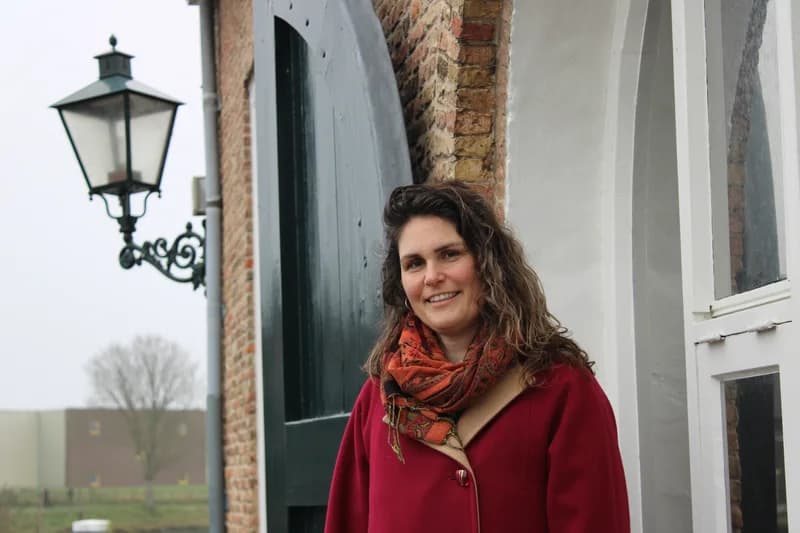 Gaby wearing a red jacket